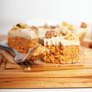 Raw carrot cake bites on a cutting board