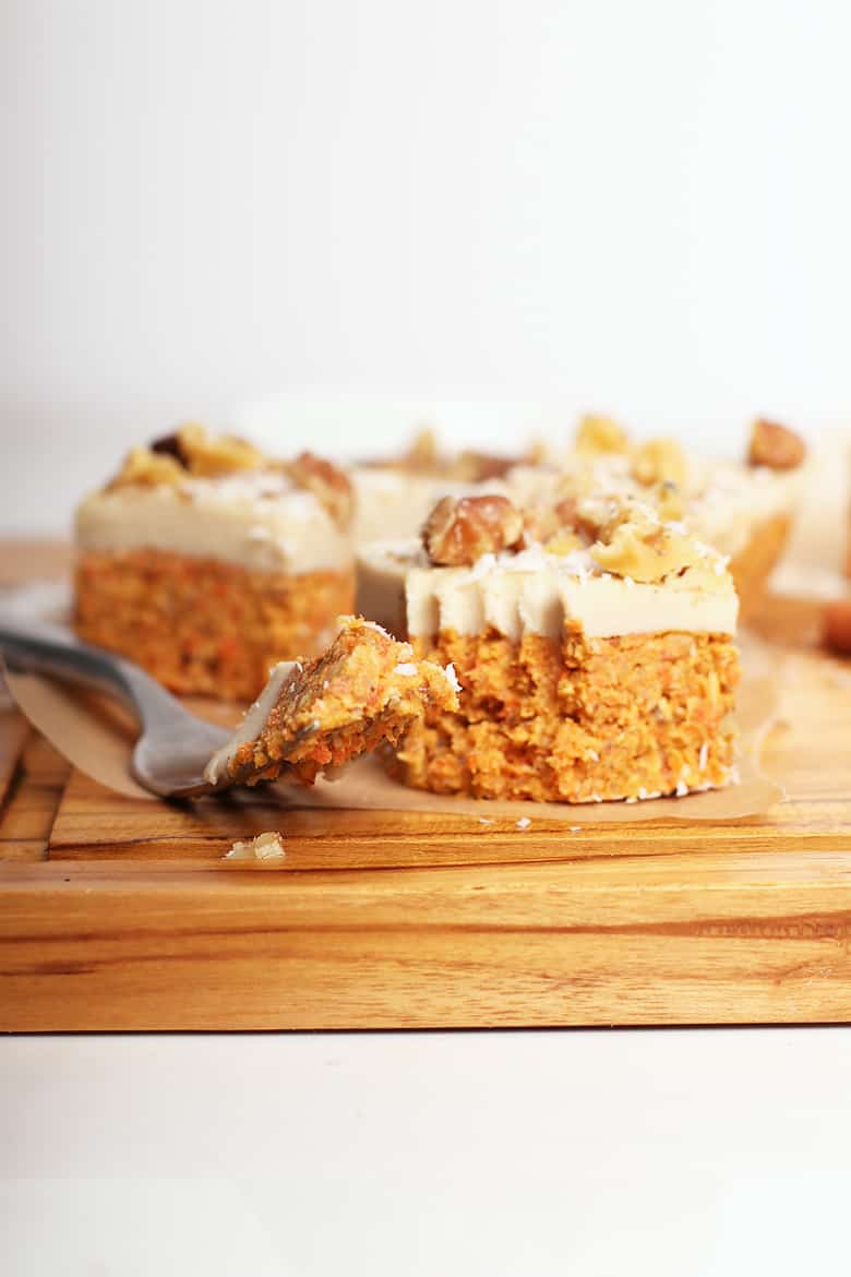 Raw carrot cake bites on a cutting board