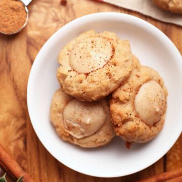 Finished thumbprint cookies in small white bowl