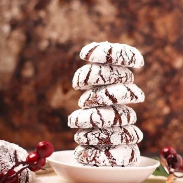 Stack of vegan chocolate crinkle cookies