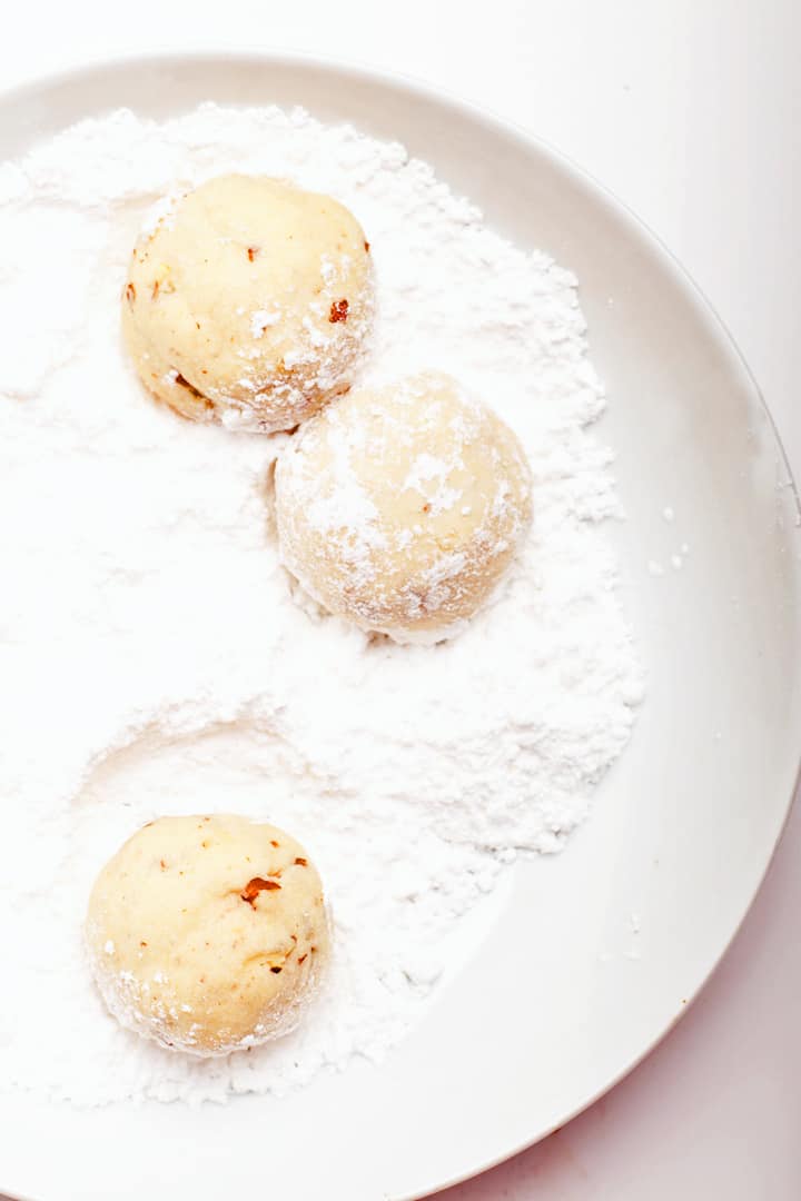 Finished cookies rolled in powdered sugar