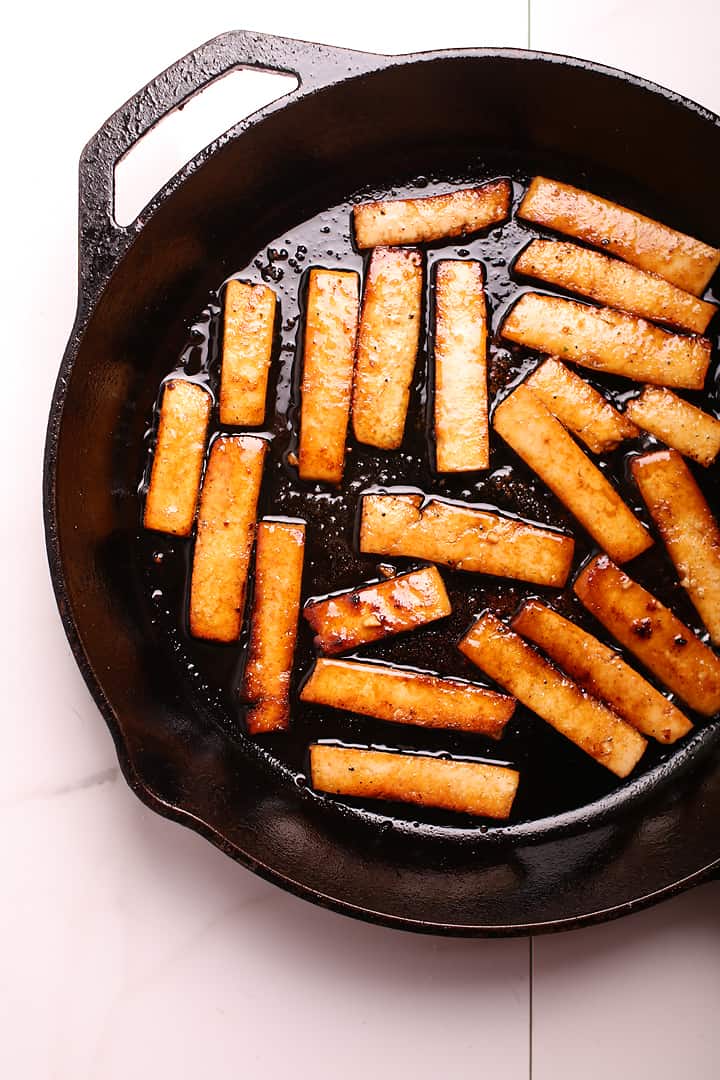 Sautéed tofu in a cast iron skillet