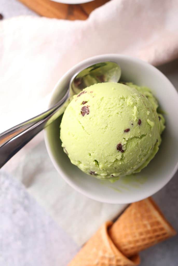 Bowl of mint chip ice cream with a spoon