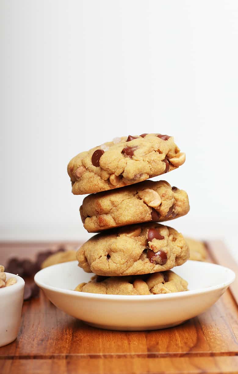 Stacked gluten free cookies in a white bowl