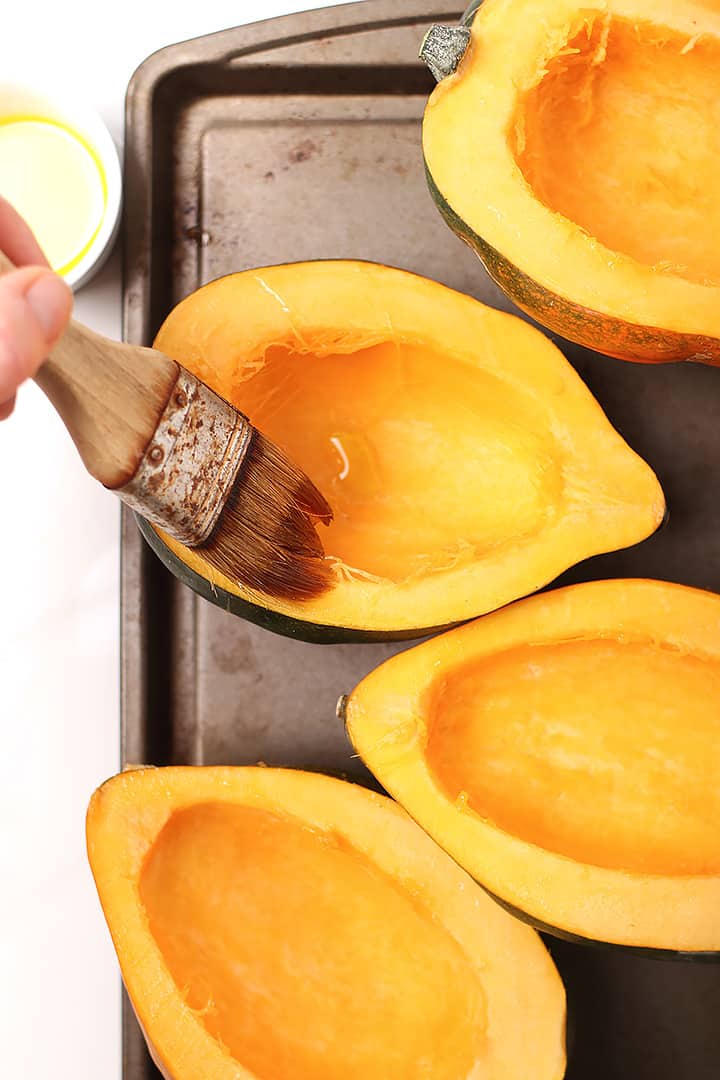 Acorn squash on baking sheet