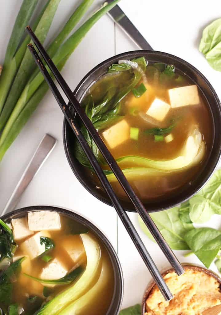 Bowl of miso soup with chopsticks