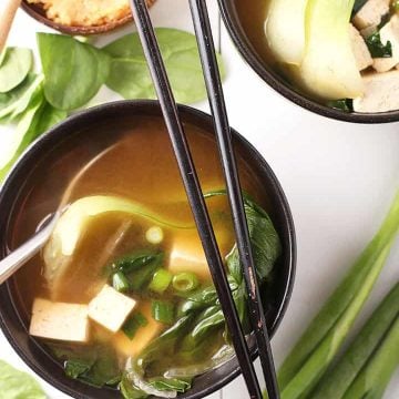 Miso soup in a black bowl