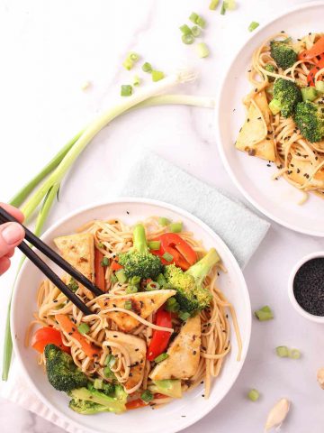 Udon Noodle Stir Fry on two white plates