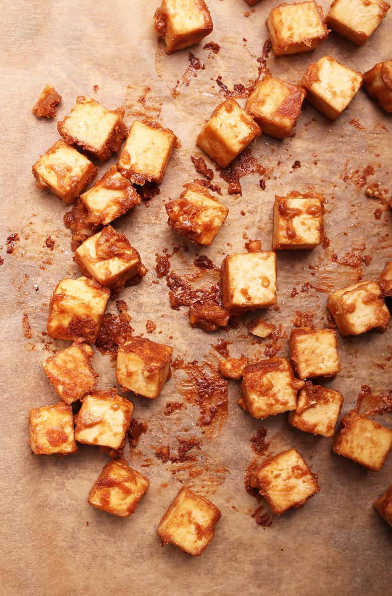 Cooked tofu on a baking sheet