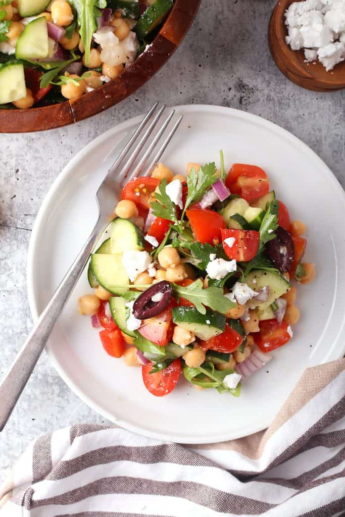 Finished Greek salad on a white plate