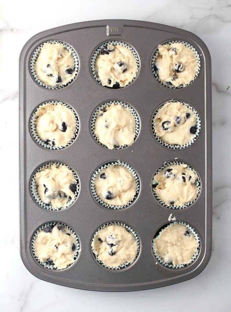 Muffin batter in muffin tin