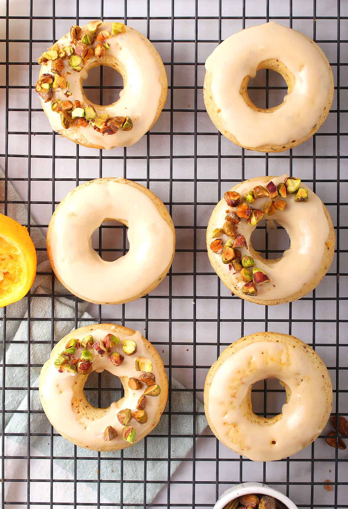 Finished doughnuts on a cooling rack