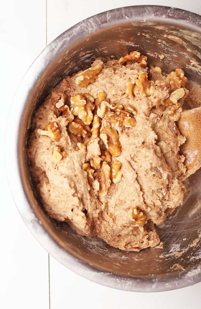 Banana bread batter with chopped walnuts