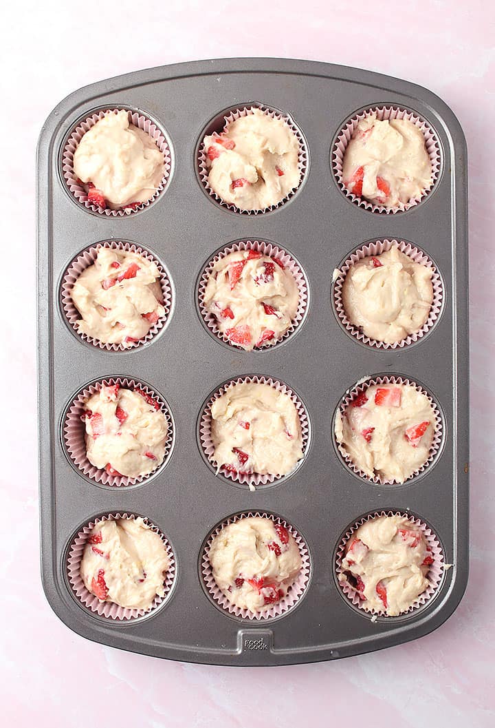 Muffin batter in muffin tin