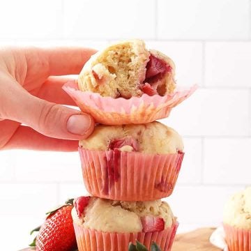 Stack of muffins with a bite out of it