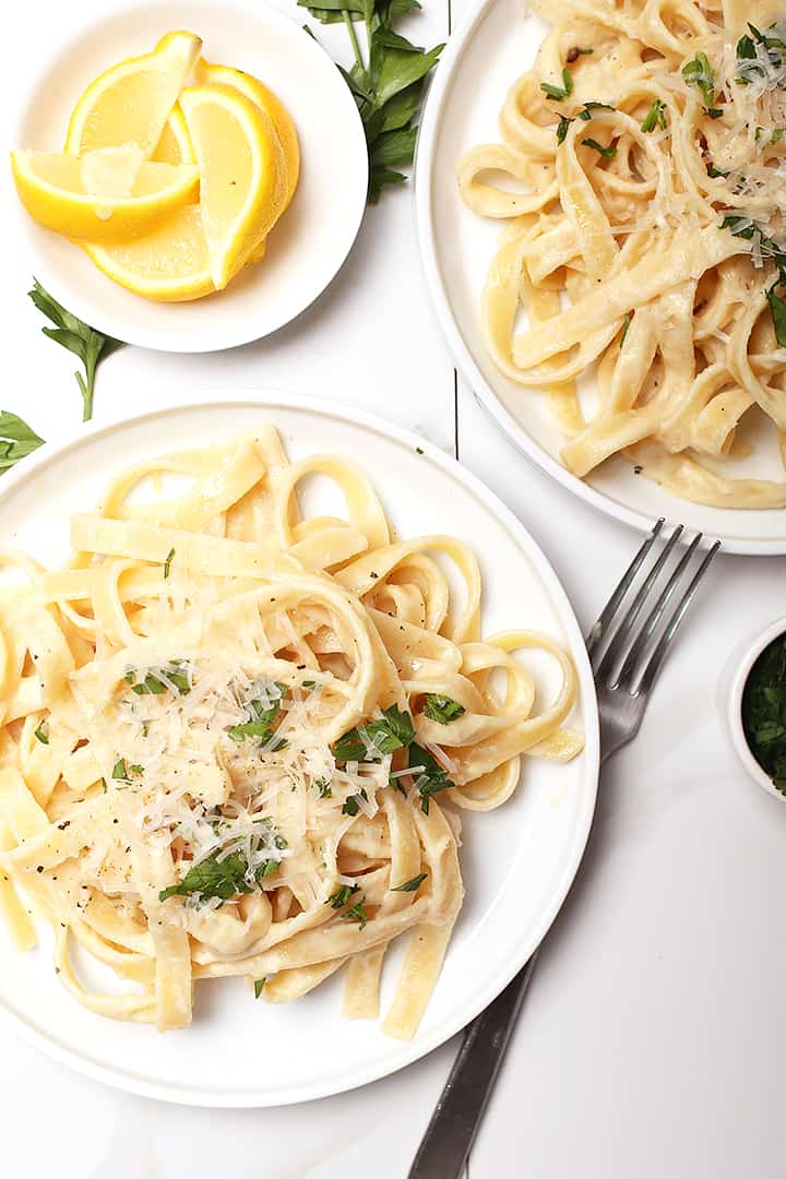 Finished dish with vegan parmesan and fresh parsley