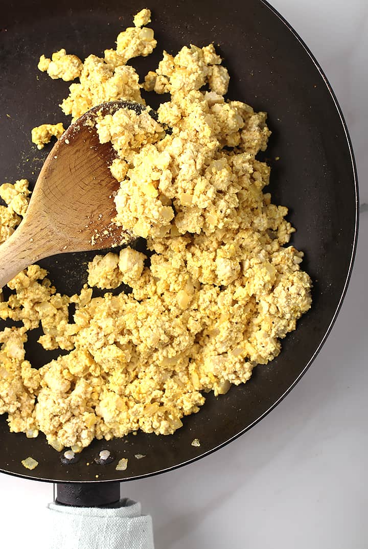 Seasoned tofu in a skillet