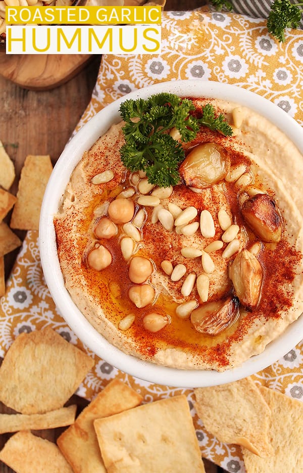 A classic roasted garlic hummus made with chickpeas, tahini, fresh spices and herbs, and sweet roasted garlic for a dip that everyone will love. Made in just 30 minutes for a quick and easy appetizer. #mydarlingvegan #hummus