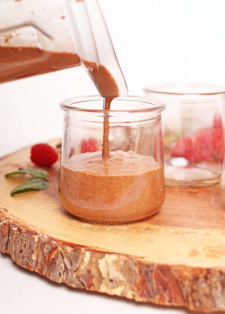 Chocolate pudding poured into a glass jar