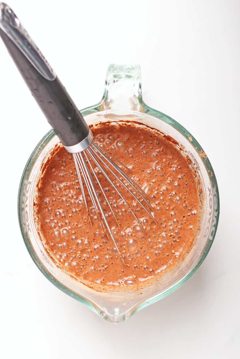 Chocolate pudding in a liquid measuring cup