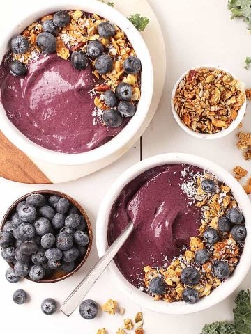 Two vegan blueberry smoothie bowls