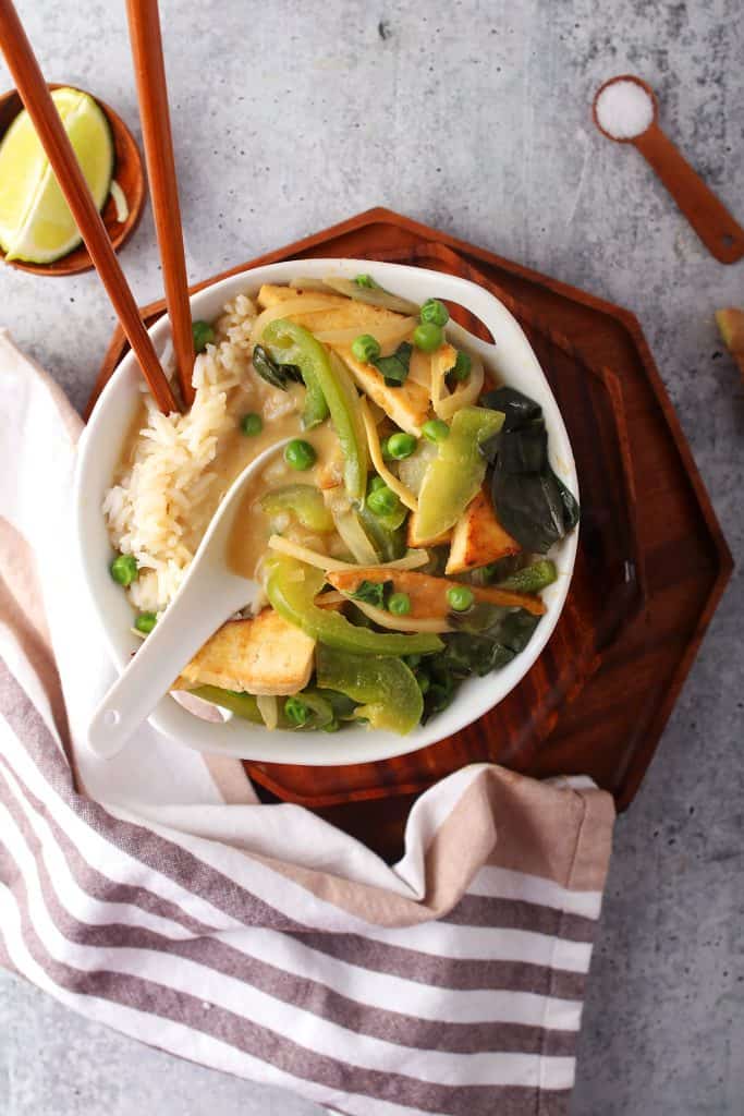 Bowl of Thai Green Curry with chop sticks