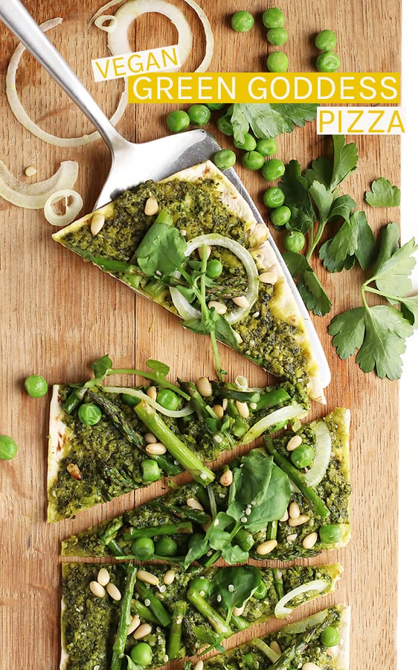 This vegan Green Goddess Pizza is made with kale pesto, then topped with fresh asparagus, peas, watercress, and pine nuts for the perfect springtime meal. #vegan #vegetarian #greengoddess #pizza #flatoutflatbread #sponsored #healthy #mydarlingvegan