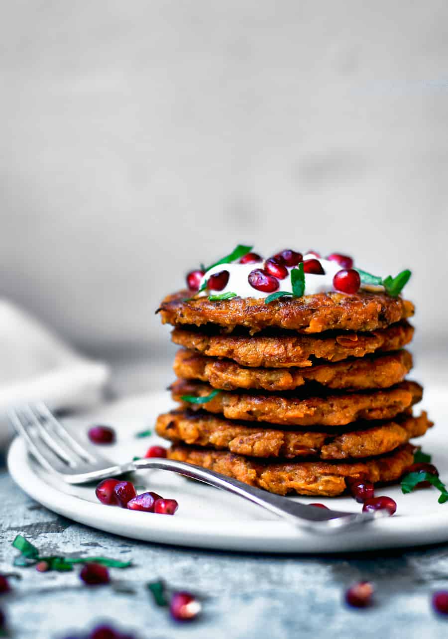 Stack of Spicy Sweet Potato Pancake with pomegranate.
