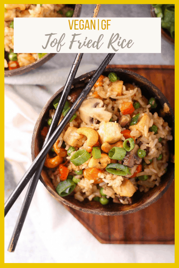 Make take-out at home! This Tofu Fried Rice is made with crispy tofu, carrots, peas, and cashews for a hearty and delicious plant-based and gluten-free meal the whole family will love.