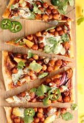 BBQ Chickpea Pizza on a wooden platter