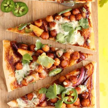 BBQ Chickpea Pizza on a wooden platter