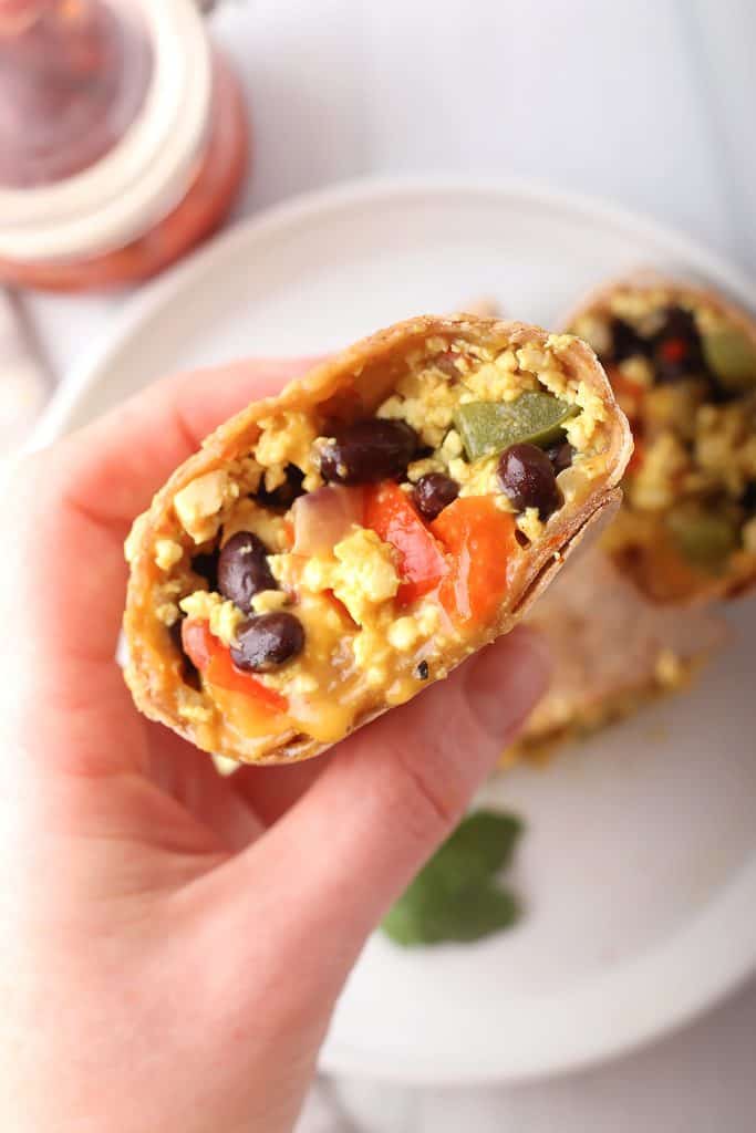 Close up shot of vegan breakfast burrito