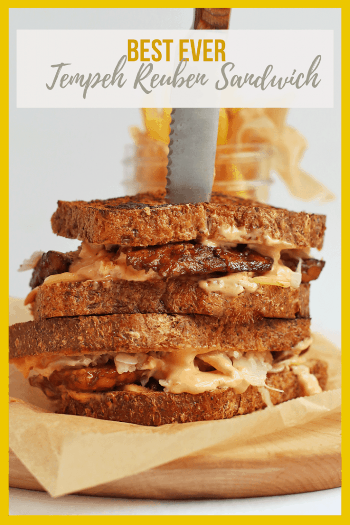 You're going to love this Vegan Tempeh Reuben! It is made with marinated and grilled tempeh, homemade Russian Dressing, and seeded rye bread for a saucy and delicious classic vegan sandwich.