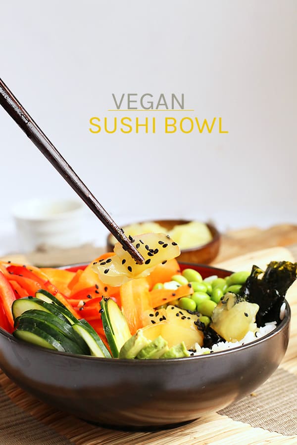 This vegan sushi bowl is made with quick pickled carrots and cucumbers, avocado, and edamame, all tossed in sesame soy dressing and served over rice. Made in just 30 minutes for a delicious vegan and gluten-free meal.