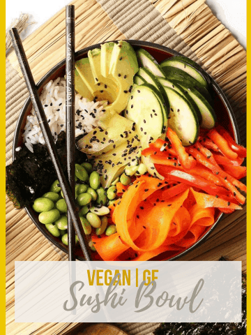 This vegan sushi bowl is made with quick pickled carrots and cucumbers, avocado, and edamame, all tossed in sesame soy dressing and served over rice. Made in just 30 minutes for a delicious vegan and gluten-free meal.