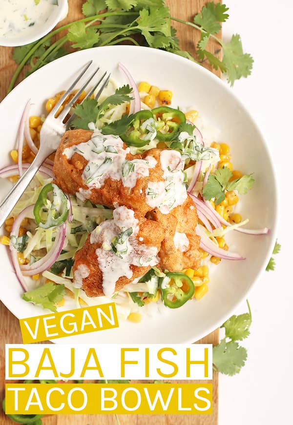 This Vegan Fish Tacos bowl is made with beer-battered vegan "fish", fresh Baja cabbage slaw, seasoned corn, and creamy Baja sauce for a meal everyone will love. #veganfish #fishtacos #veganbowls #veganrecipes