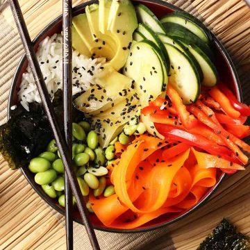 Finished sushi bowl with chopsticks