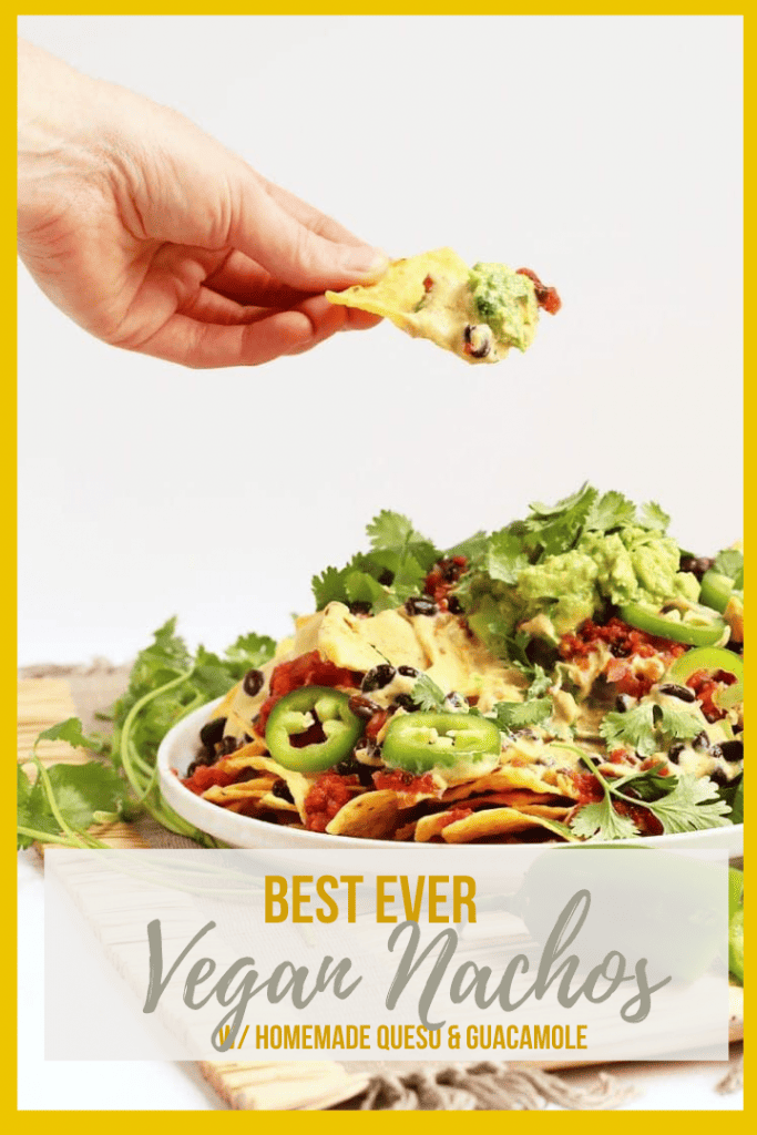 These Homemade Vegan Nachos are made with easy guacamole, vegan queso, and all the fixings for a delicious gluten-free party dish. You won't be able to get enough!