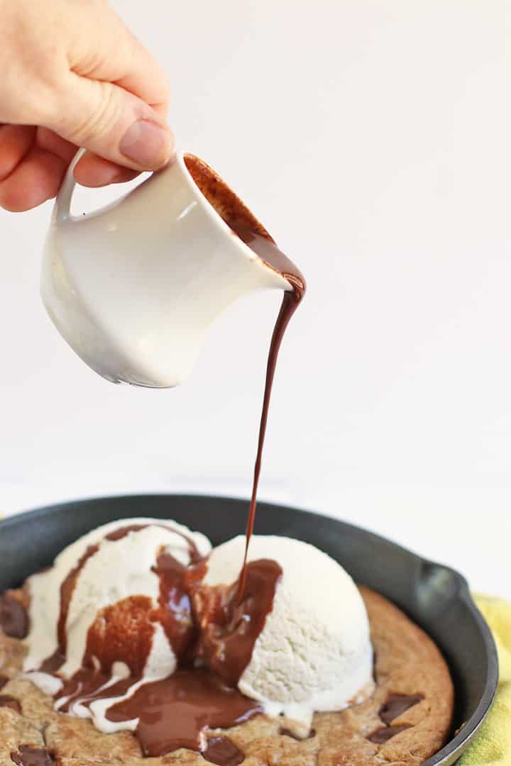 Chocolate sauce poured over finished dessert