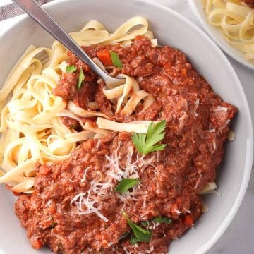 Finished bowl of vegan pasta with a fork