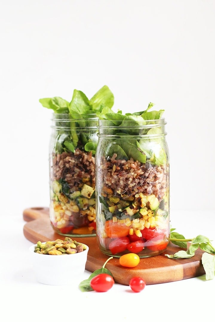 Finished salads in two large mason jars