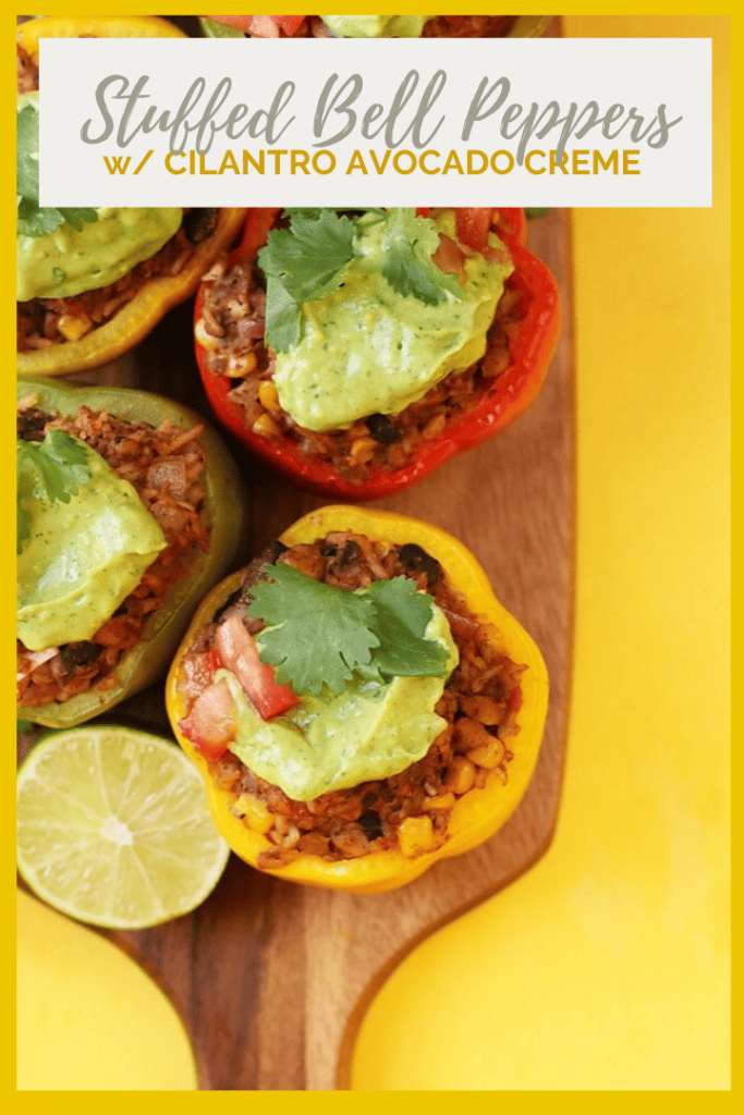 These Mexican-Style Vegan Stuffed Peppers are perfect! They are filled with tempeh, corn, beans, and spices and topped with a homemade avocado cream for a delicious and healthy vegan and gluten-free meal.