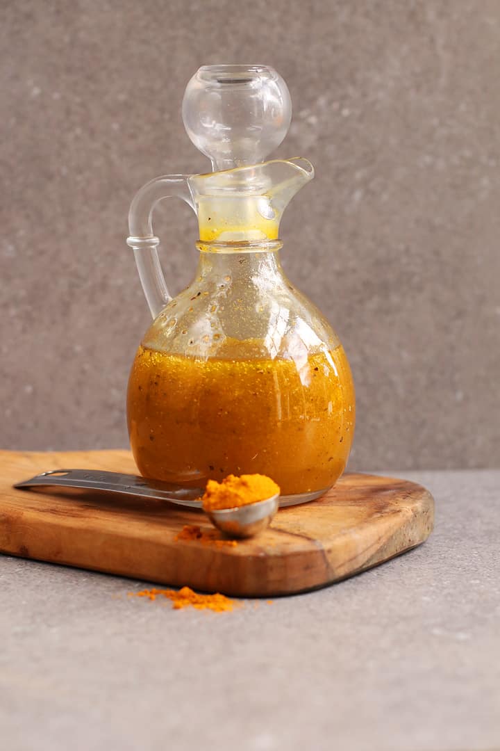 Curry Vinagrette in a small glass pitcher