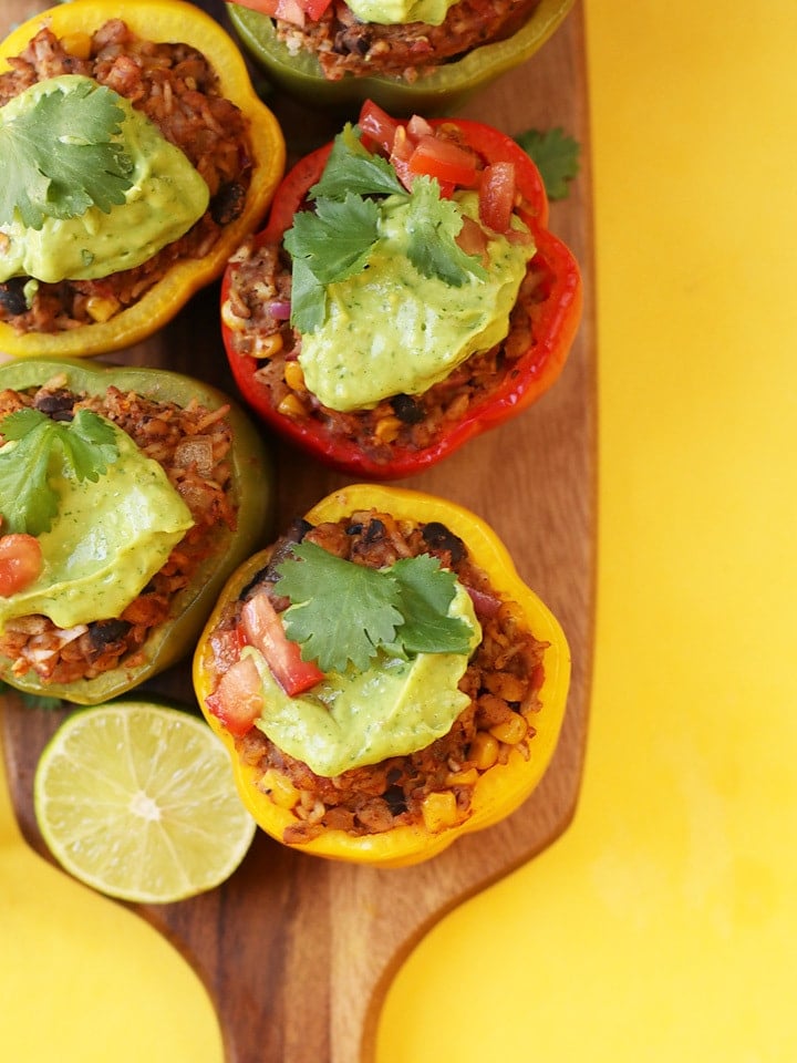 Overhead shot of Stuffed Bell Peppers on wooden board