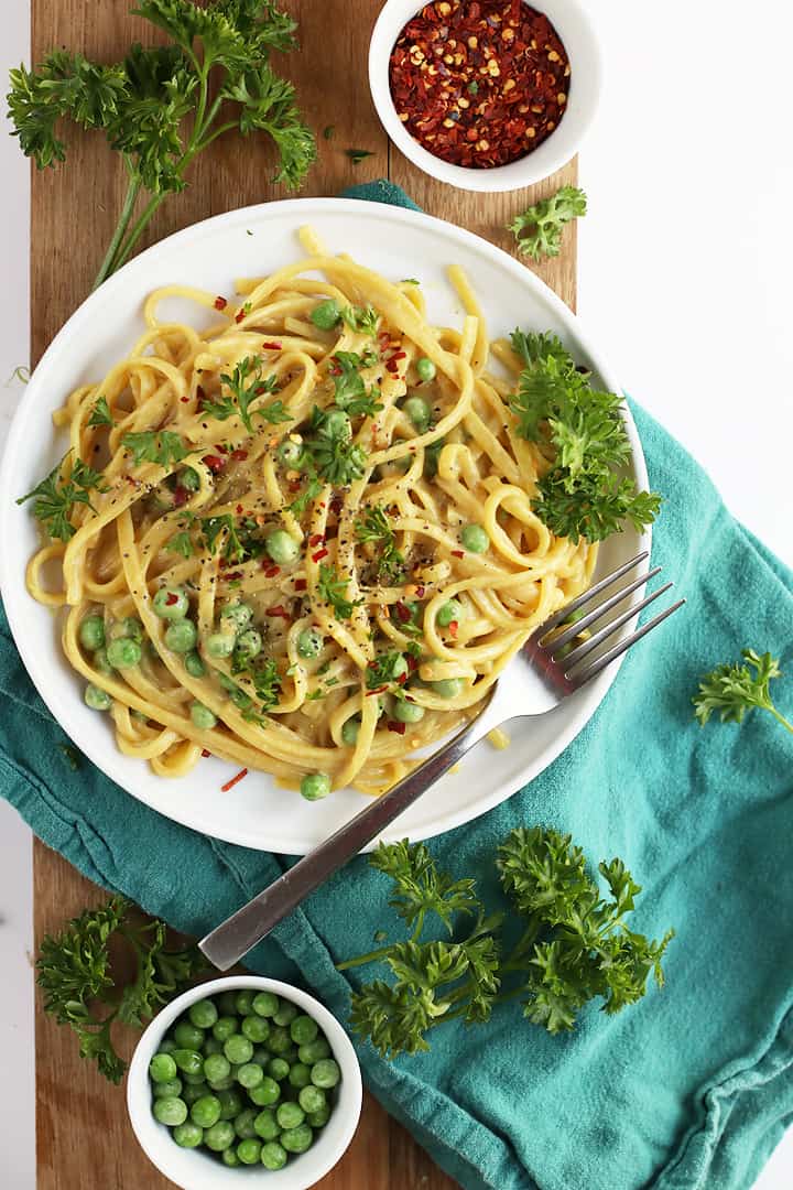 White Wine Pasta on a white plate with a fork