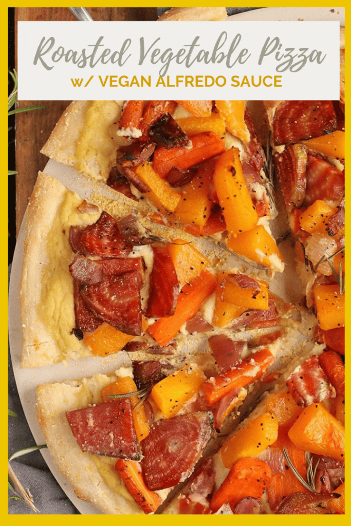 Bite into this delicious Roasted Vegetable Pizza. It's made with roasted butternut squash, beets, carrots atop a creamy vegan cauliflower Alfredo Sauce and served on a cornmeal pizza crust.