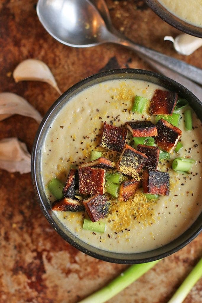 Overhead shot of finished soup with coconut bacon