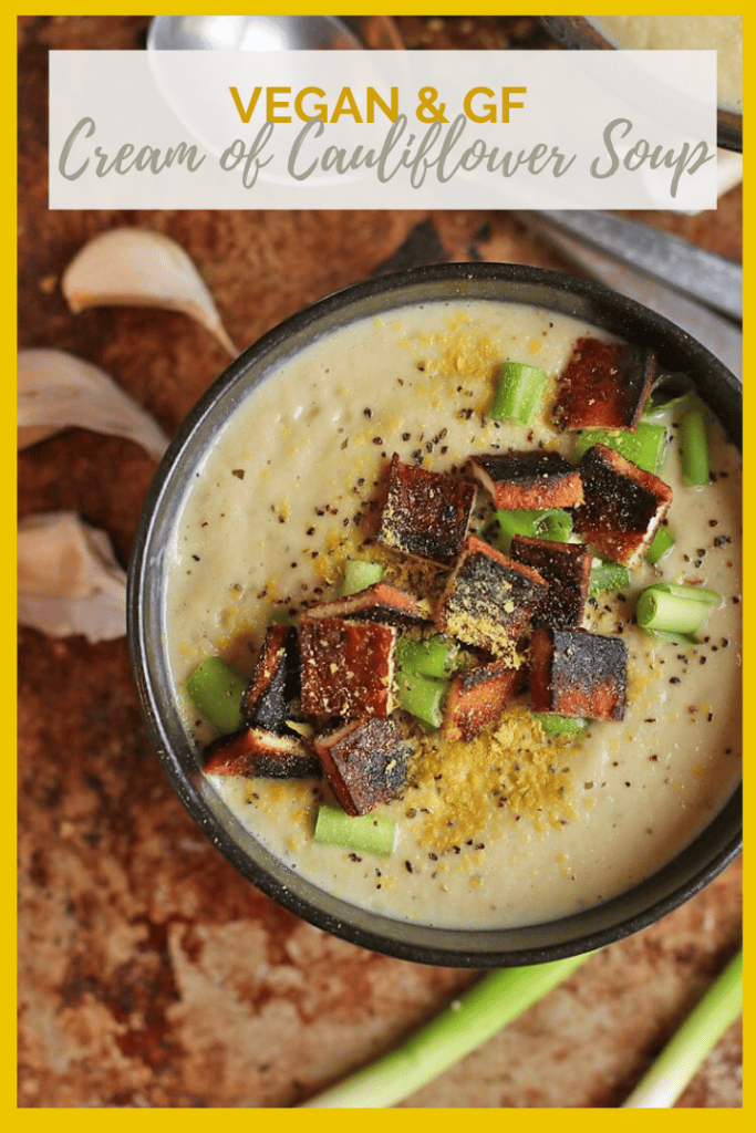 This Vegan Cream of Cauliflower Soup is so rich and creamy! It's made with cashew cream, creamy cauliflower, and nutritional yeast and topped with tofu bacon for a delicious gluten-free meal. 