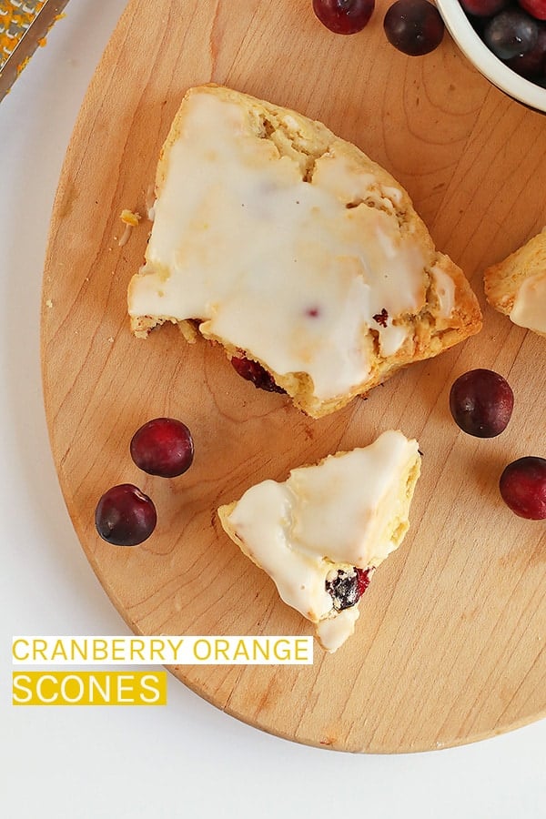 Wake up this Christmas morning with these delightfully sweet and tart Vegan Cranberry Orange Scones topped with Orange Glaze. #vegan #vegetarian #christmas #veganchristmas #chistmasrecipes #veganscones #veganbreakfast #cranberries #mydarlingvegan