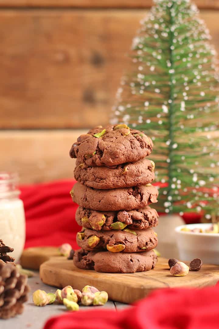 Stack of finished cookies on a wooden board.